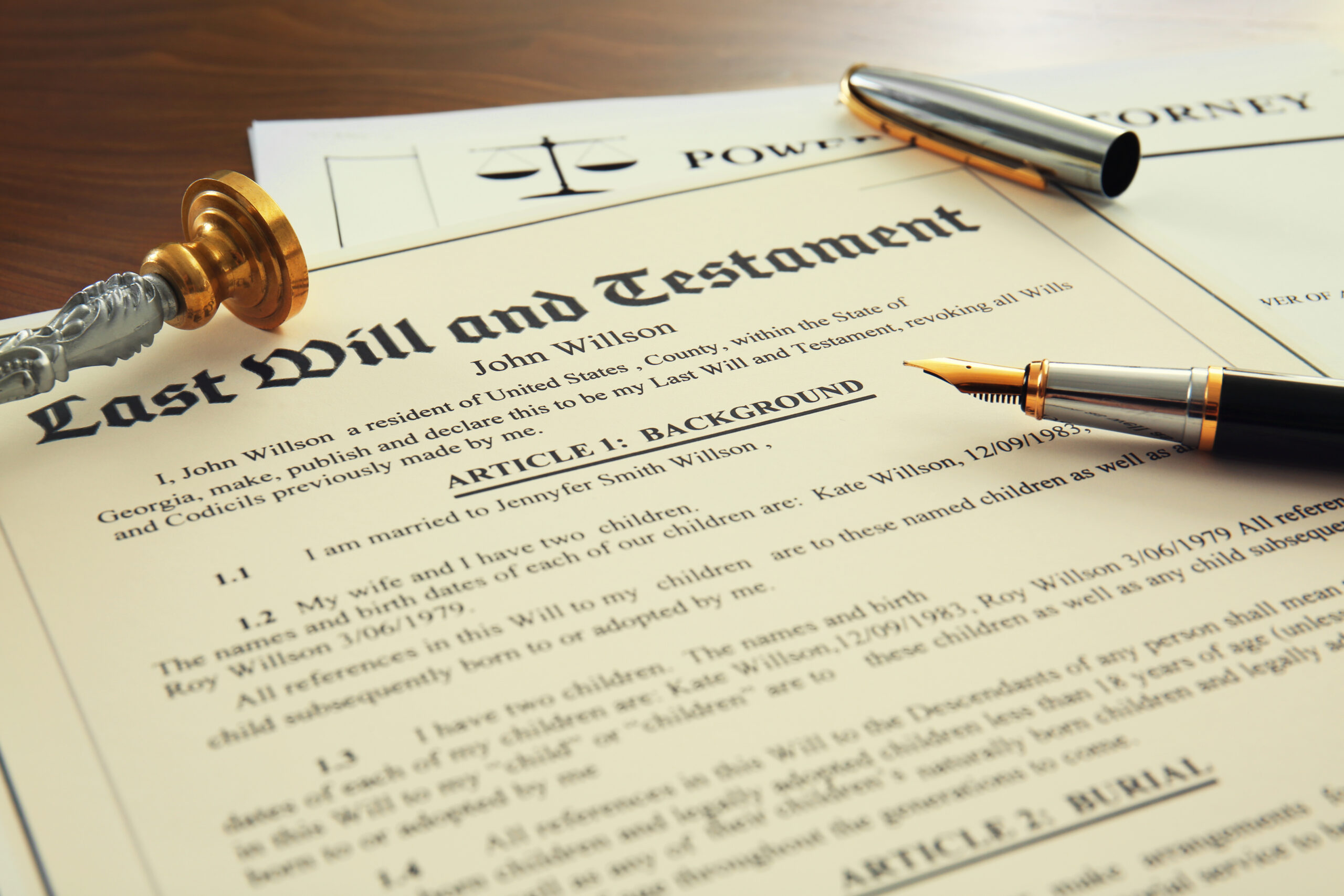 Pen, stamp and documents on notary public table