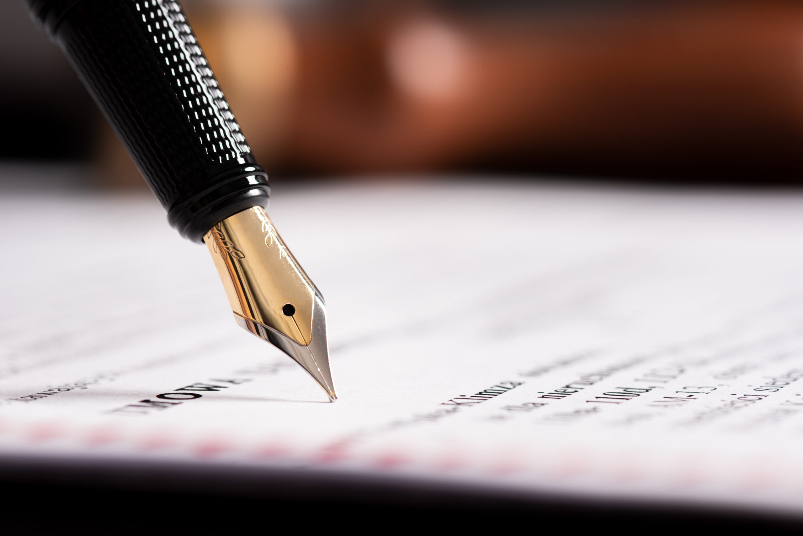 Law, notary background theme. Fountain pen and handmade paper on desk